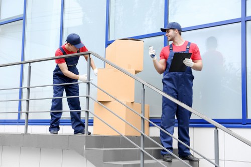 Staff member assessing a storage complaint with documentation