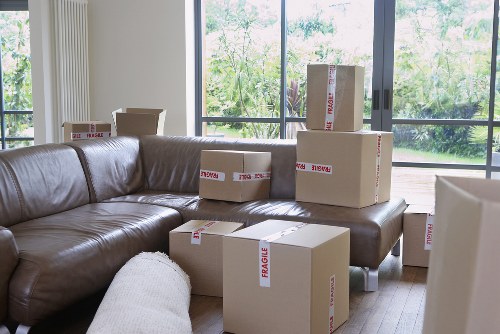 Packing and moving boxes prepared for a flat removal service in Newaddington